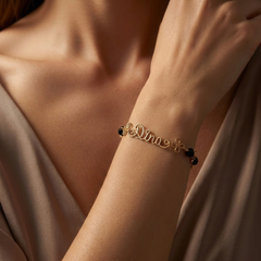 Gold bracelet with black six crystals