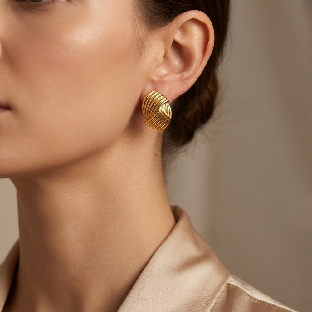 bold chunky ribbed design crafted in gold-plated stainless steel for a modern look