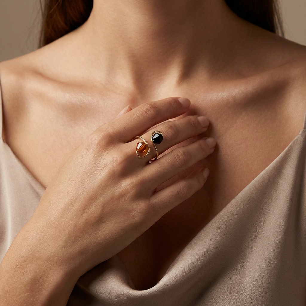 Minimalist adjustable ring with a light-catching finish, crafted for everyday elegance