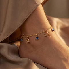 minimalist gold-filled anklet featuring a symbolic charm, designed for everyday elegance and protective style
